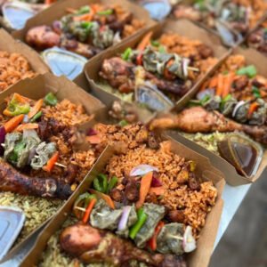 Rich Jollof or Fried rice with 1 chicken grilled / chops veggies / pepper