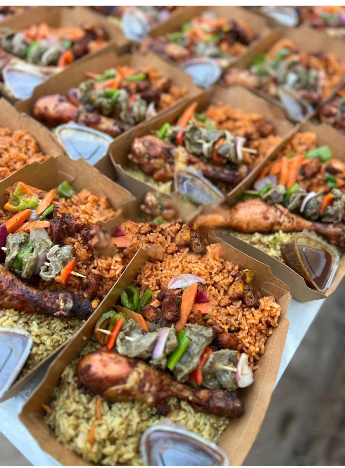 Rich Jollof or Fried rice with 1 chicken grilled / chops veggies / pepper